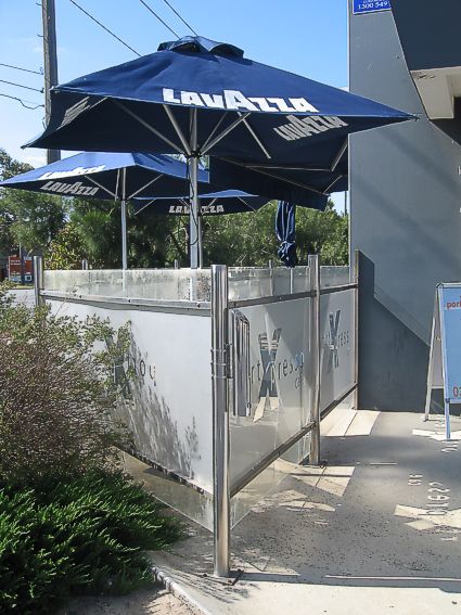 Port Xpresso Cafe - After - Solution: Eco-Pole Post Ashtray at entrance